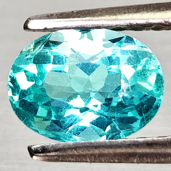 Natural Paraiba Color Apatite Gemstones 0.81 Ct. Oval Shape 6.7 x 5.9 Mm.: Product ID: 800613687 Product Name: Natural Apatite Weight: 0.81 CT. Size: 6.7 x 5.9 x 3.6 MM. Shape: Oval Color: Neon Blue Clarity:VSI Luster: Good Gems Origin: Tanzania Treatment: Unheated Crystal S