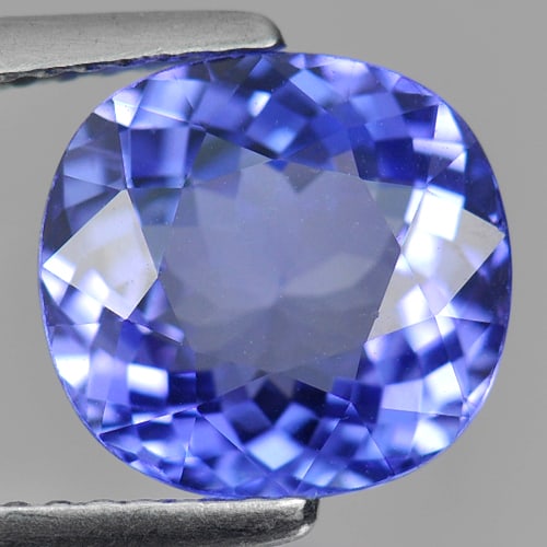 Natural Violetish Blue Tanzanite Gemstones 3.30 Ct. Clean Cushion Shape 9.49 x 8.93 Mm.: Product ID: 807006203 Product Name: Natural Tanzanite Weight: 3.30 CT. Size: 9.49 x 8.93 x 5.08 MM. Shape: Cushion Color: Blue Clarity:IF Luster: Very Good Gems Origin: Tanzania Treatment: Heated Crys