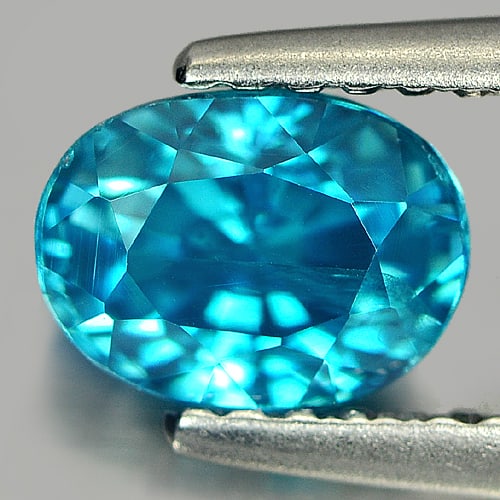 Natural Blue Color Zircon Gemstones 1.84 Ct. Oval Shape 6.8 x 5.1 Mm.: Product ID: 807712921 Product Name: Natural Zircon Weight: 1.84 CT. Size: 6.8 x 5.1 x 5 MM. Shape: Oval Color: Blue Clarity:VSI Luster: Good Gems Origin: Cambodia Treatment: Heated Crystal Structure: 