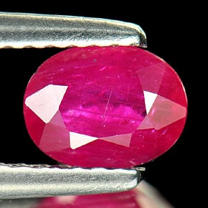 Natural Purplish Pink Ruby Gemstones 0.75 Ct. Oval Shape 6.4 x 4.9 Mm.: Product ID: 805927068 Product Name: Natural Ruby Weight: 0.75 CT. Size: 6.4 x 4.9 x 2.8 MM. Shape: Oval Color: Purplish Pink Clarity:VSI Luster: Good Gems Origin: Tanzania Treatment: Heated (Lead-glas