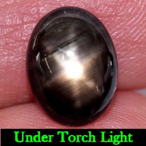 Natural Black Star Sapphire Gemstones 3.71 Ct. Oval Cabochon Shape 10.4 x 7.9 Mm.: Product ID: 806132943 Product Name: Natural Star Sapphire Weight: 3.71 CT. Size: 10.4 x 7.9 x 4 MM. Shape: Oval Cabochon Color: Black Clarity:Opaque Luster: Good 6 Rays Star Gems Origin: Thailand Trea
