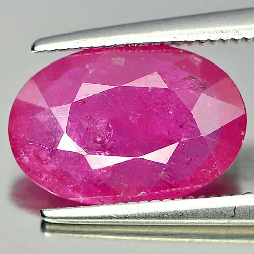 Natural Purplish Pink Ruby Gemstones 3.07 Ct. Oval Shape 12.3 x 8.4 Mm.: Product ID: 805917761 Product Name: Natural Ruby Weight: 3.07 CT. Size: 12.3 x 8.4 x 3.1 MM. Shape: Oval Color: Purplish Pink Clarity:VSI Luster: Good Gems Origin: Mozambique Treatment: Heated (Lead-g
