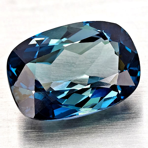 Natural London Blue Topaz Gemstones 5.02 Ct. Cushion Shape 11.9 x 8.3 Mm.: Product ID: 807168328 Product Name: Natural Blue Topaz Weight: 5.02 CT. Size: 11.9 x 8.3 x 5.8 MM. Shape: Cushion Shape Color: London Blue Clarity:VVS Luster: Good Gems Origin: Brazil Treatment: Treat