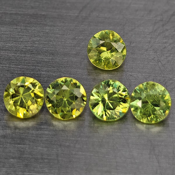 Natural Green Demantiod Garnet Gemstones 0.44 Ct. 5 Pcs. Round Diamond Cut 2.8 Mm.: Product ID: 802937444 Product Name: Natural Demantoid Weight: 0.44 CT. Size: 2.8 x 2.8 x 2 MM. Shape: Round Diamond Cut Color: Green Clarity:SI1 Luster: Good Gems Origin: Madagascar Treatment: Unheate