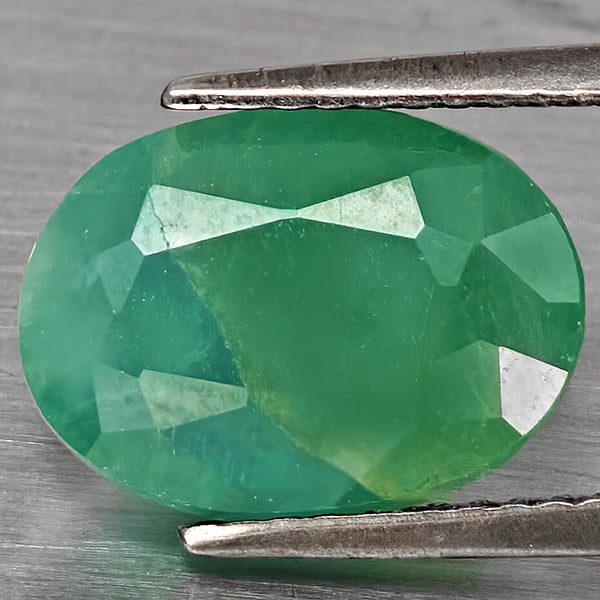 Natural Green Blueish Grandidierite Gemstons 4.10 Ct . Oval Shape 11.9 x 8.6 Mm.: Product ID: 803100054 Product Name: Natural Tsavorite Weight: 4.10 CT. Size: 11.9 x 8.6 x 5.2 MM. Shape: Oval Shape Color: Green Blueish Clarity:SI1 Luster: Good Gems Origin: Madagascar Treatment: Unh