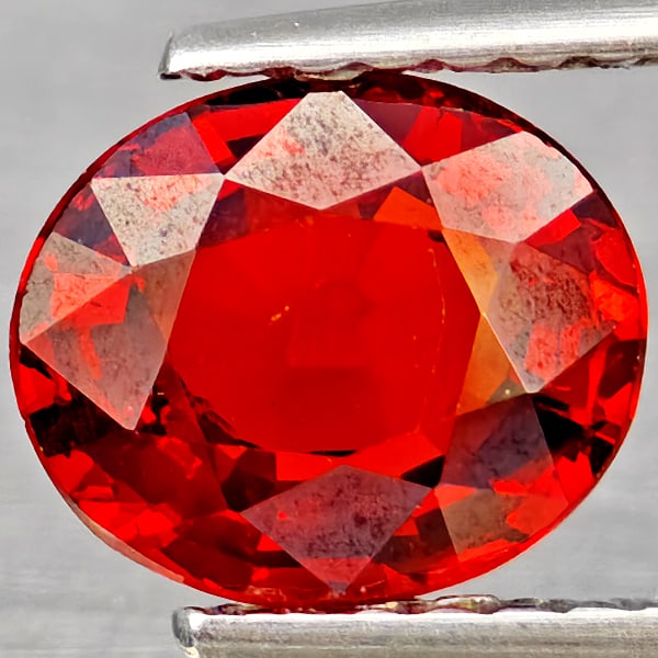 Natural Orangish Red Spessartine Garnet Gemstones 1.47 Ct. Oval Shape 7.4 x 6.3 Mm.: Product ID: 802937191 Product Name: Natural Spessartine Weight: 1.47 CT. Size: 7.4 x 6.3 x 3.5 MM. Shape: Oval Color: Orangish Red Clarity:VSI Luster: Good Gems Origin: Namibia Treatment: Unheated Cry