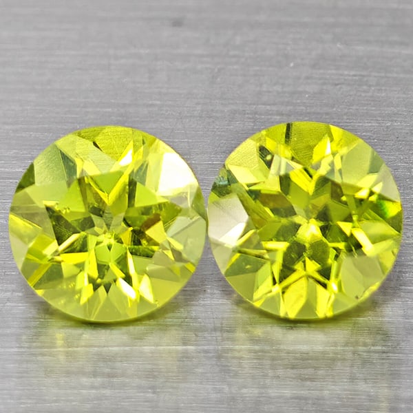 Natural Green Peridot Gemstones 1.13 Ct. 2 Pcs. Round Shape 5.2 Mm.: Product ID: 805317582 Product Name: Natural Peridot Weight: 1.13 CT. Size: 5.2 x 5.2 x 3.4 MM. Shape: Round Color: Green Clarity:VSI Luster: Good Gems Origin: Pakistan Treatment: Unheated Crystal Stru