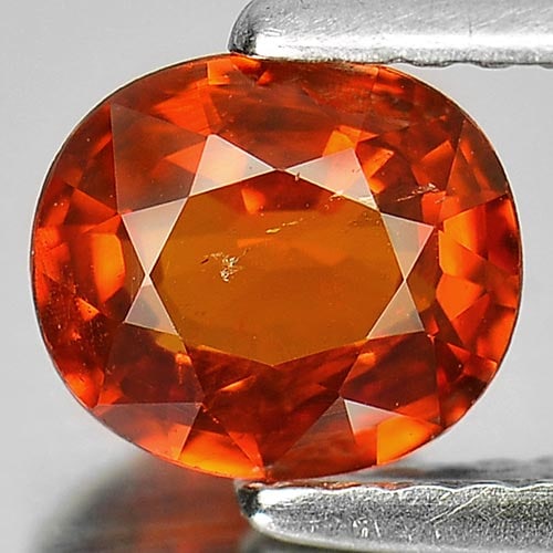 Natural Reddish Orange Spessartine Garnet Gemstones 1.19 Ct. Oval Shape 6.2 x 5.9 Mm.: Product ID: 802922302 Product Name: Natural Spessartine Weight: 1.19 CT. Size: 6.2 x 5.9 x 3.5 MM. Shape: Oval Color: Reddish Orange Clarity:SI Luster: Good Gems Origin: Nigeria Treatment: Unheated Cr