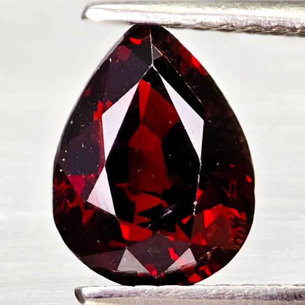 Natural Orangish Red Spessartine Garnet Gemstones 2.38 Ct. Pear Shape 8.9 x 6.8 Mm.: Product ID: 802936603 Product Name: Natural Spessartine Weight: 2.38 CT. Size: 8.9 x 6.8 x 4.9 MM. Shape: Pear Shape Color: Orangish Red Clarity:VSI - SI1 Luster: Good Gems Origin: Namibia Treatment: 