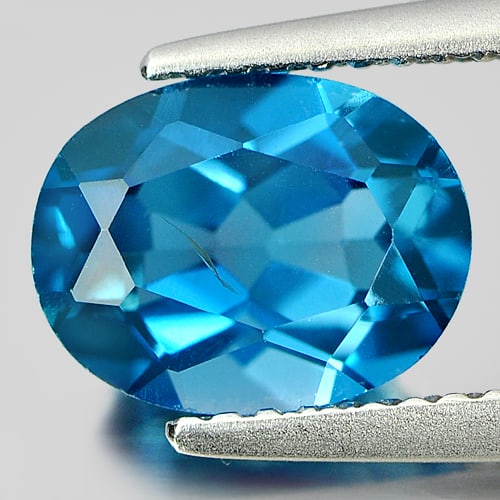Natural London Blue Topaz Gemstones 2.39 Ct. Oval Shape 9.1 x 7.1 Mm.: Product ID: 807162663 Product Name: Natural Blue Topaz Weight: 2.39 CT. Size: 9.1 x 7.1 x 4.8 MM. Shape: Oval Color: London Blue Clarity:VSI Luster: Good Gems Origin: Brazil Treatment: Treated Crystal