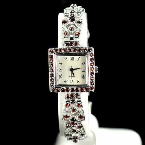 Natural Spessartine Garnet 925 Silver Sterling Ladies Wrist Watch 7 Inch 38.24 Grams: Product ID: 203100396 Product Type: 925 Sterling Silver Fine Jewelry Jewelry Weight: 38.24 Grams. Gemstones Color: Orange Red Metal: Solid Silver 92.5%. Gemstone Detail: Center: Orange Red Spessartine
