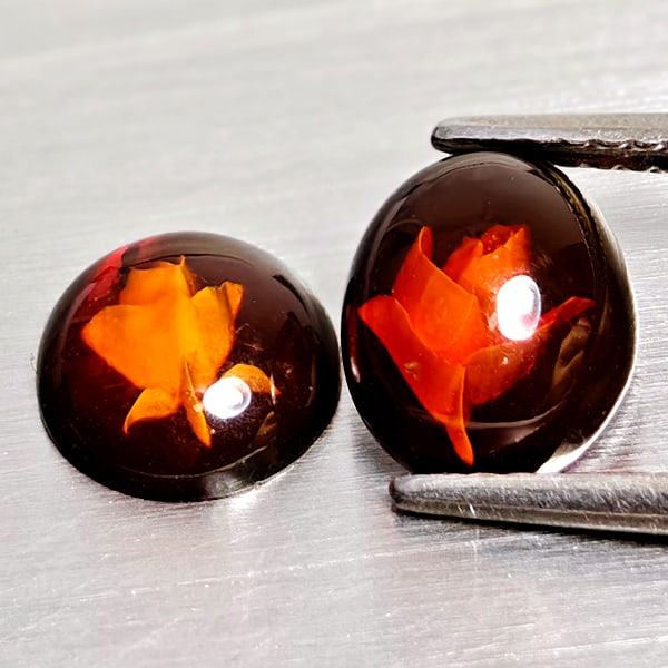 Natural Brown Yellow Amber 1.00 Ct. 2 Pcs Flower Carving In Oval Cabochon Shape 8.3 x 6.9 Mm.: Product ID: 819091040 Product Name: Natural Amber Weight: 1.00 CT. Size: 8.3 x 6.9 x 3.4 MM. Shape: Oval Cabochon Color: Brown Yellow Clarity:Semi - Transparent Luster: Good Gems Origin: Poland Treatm