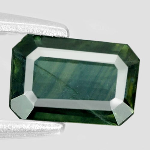 Natural Bluish Green Sapphire Gemstones 0.66 Ct. Octagon Shape 6.4 x 4.2 Mm.: Product ID: 806158763 Product Name: Natural Green Sapphire Weight: 0.66 CT. Size: 6.4 x 4.2 x 2.1 MM. Shape: Octagon Color: Bluish Green Clarity:VSI Luster: Good Gems Origin: Thailand Treatment: Heate
