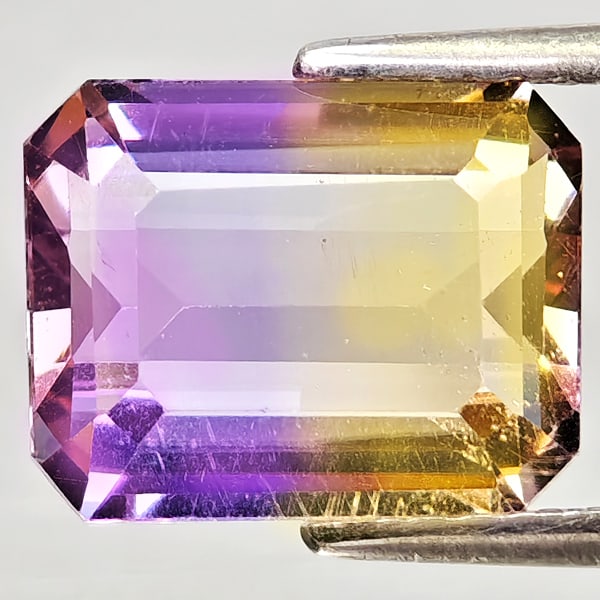 Natural Bi Color Ametrine Gemstones 3.07 Ct. Octagon Shape 10.1 x 8 Mm.: Product ID: 800408285 Product Name: Natural Ametrine Weight: 3.07 CT. Size: 10.1 x 8 x 5 MM. Shape: Octagon Color: Bi Color Clarity:VSI Luster: Good Gems Origin: Bolivia Treatment: Unheated Crystal St