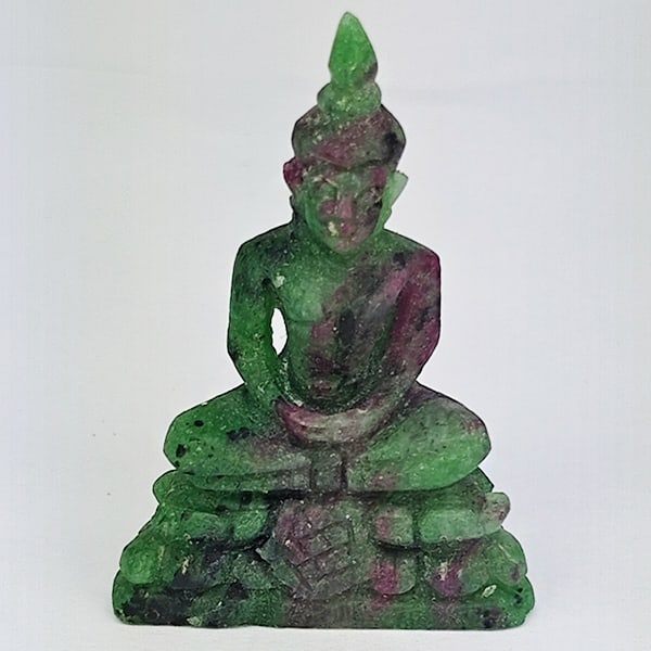 Natural Red Green Ruby in Zoisite Gemstones 68.81 Ct. Buddha Carving Size 43 x 29 Mm.: Product ID: 805935842 Product Name: Natural Zoisite Carving Weight: 68.81 CT. Size: 43 x 29 x 13.3 MM. Shape: Carving shape Color: Red Green Clarity:Opaque Luster: Good Gems Origin: Madagascar Treatme