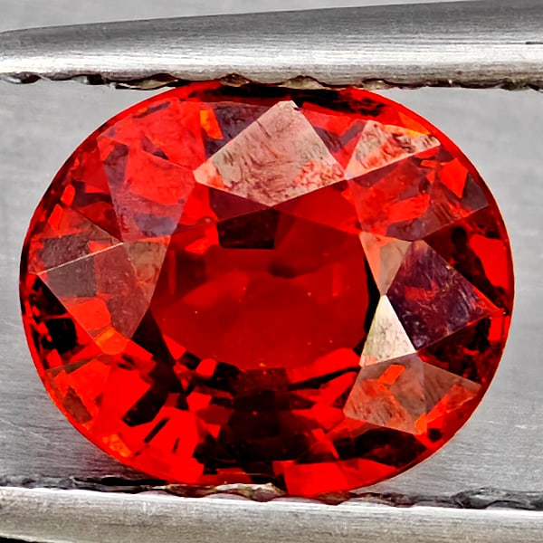 Natural Orangish Red Spessartine Garnet Gemstones 0.96 Ct. Oval Shape 6 x 5.2 Mm.: Product ID: 802937267 Product Name: Natural Garnet Weight: 0.96 CT. Size: 6 x 5.2 x 3.4 MM. Shape: Oval Shape Color: Orangish Red Clarity:SI1 Luster: Good Gems Origin: Namibia Treatment: Unheated Crys