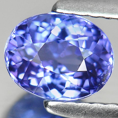 Natural Violetish Blue Tanzanite Gemstones 1.22 Ct. Oval Shape 6.8 x 5.5 Mm.: Product ID: 807006344 Product Name: Natural Tanzanite Weight: 1.22 CT. Size: 6.8 x 5.5 x 4.6 MM. Shape: Oval Color: Blue Clarity:VSI Luster: Very Good Gems Origin: Tanzania Treatment: Heated Crystal S