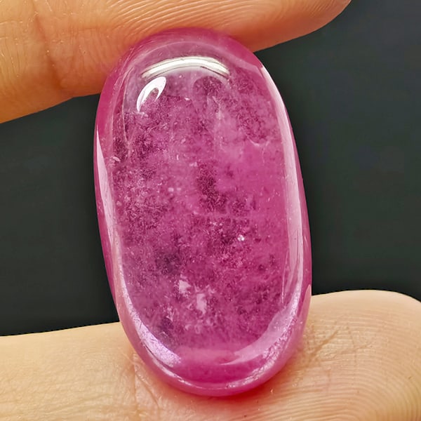 Natural Pink Red Ruby Gemstones 23.19 Ct. Oval Cabochon Shape 22.5 x 13 Mm.: Product ID: 805935277 Product Name: Natural Ruby Weight: 23.19 CT. Size: 22.5 x 13 x 6.3 MM. Shape: Oval Cabochon Color: Pinkish Red Clarity:Opaque Luster: Good Gems Origin: Madagascar Treatment: Heat
