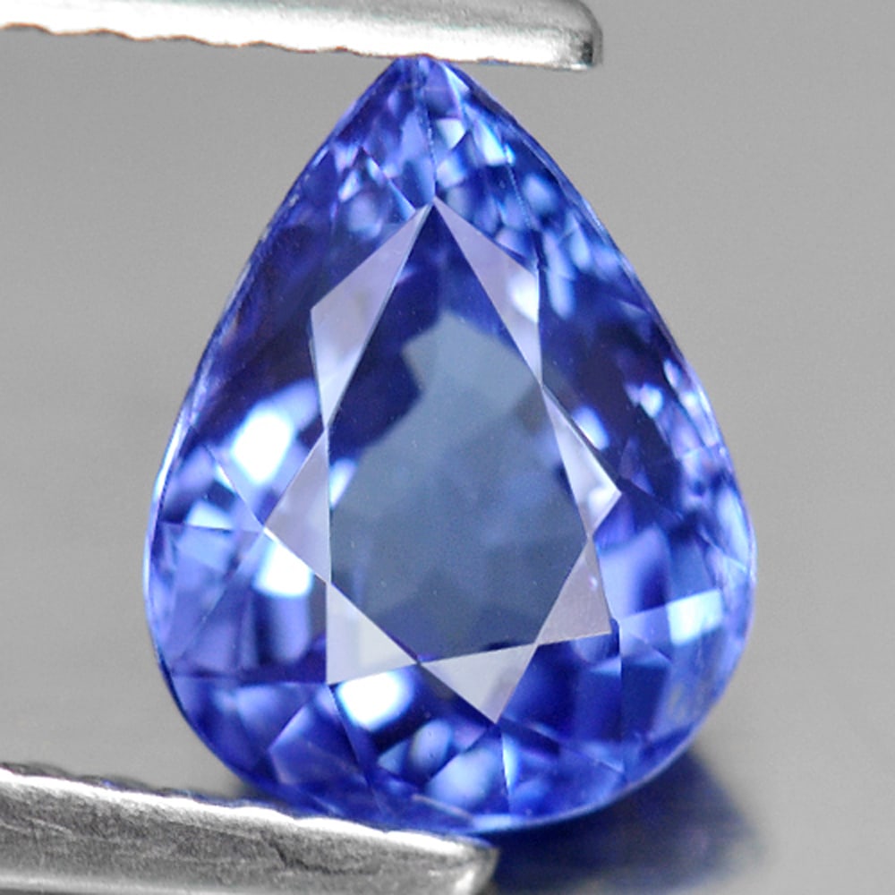 Natural Blue Tanzanite Gemstones 1.57 Ct. Pear Shape 8.3 x 6.4 Mm.: Product ID: 807006328 Product Name: Natural Tanzanite Weight: 1.57 CT. Size: 8.3 x 6.4 x 4.4 MM. Shape: Pear Color: Violetish Blue Clarity:VVS Luster: Very Good Gems Origin: Tanzania Treatment: Heated