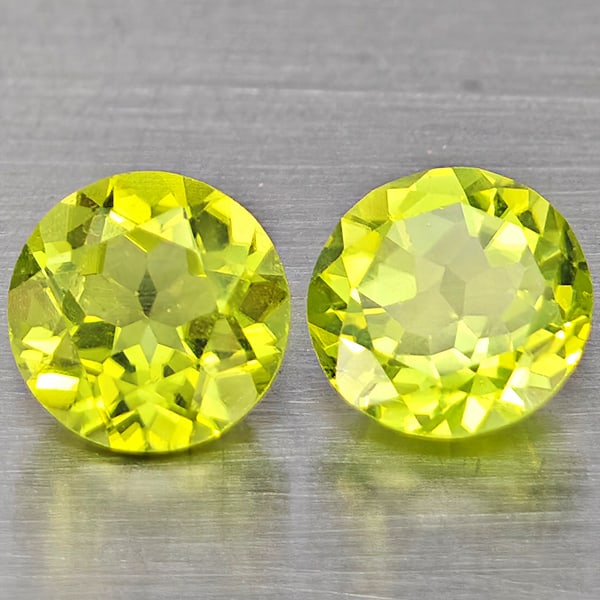 Natural Green Peridot Gemstones 1.24 Ct. 2 Pcs. Round Shape 5.2 Mm.: Product ID: 805317601 Product Name: Natural Peridot Weight: 1.24 CT. Size: 5.2 x 5.2 x 3.5 MM. Shape: Round Color: Green Clarity:VSI Luster: Good Gems Origin: Pakistan Treatment: Unheated Crystal Stru