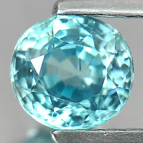 Natural Blue Zircon Gemstones 1.07 Ct. Oval Shape 5.6 x 5.3 Mm.: Product ID: 807709638 Product Name: Natural Zircon Weight: 1.07 CT. Size: 5.6 x 5.3 x 3.8 MM. Shape: Oval Color: Blue Clarity:SI Luster: Good Gems Origin: Cambodia Treatment: Heated Crystal Structure: