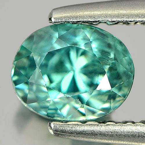 Natural Blue Zircon Gemstones 1.15 Ct. Oval Shape 5.7 x 4.6 Mm.: Product ID: 807714954 Product Name: Natural Zircon Weight: 1.15 CT. Size: 5.7 x 4.6 x 4.6 MM. Shape: Oval Color: Blue Clarity:SI Luster: Good Gems Origin: Cambodia Treatment: Heated Crystal Structure: