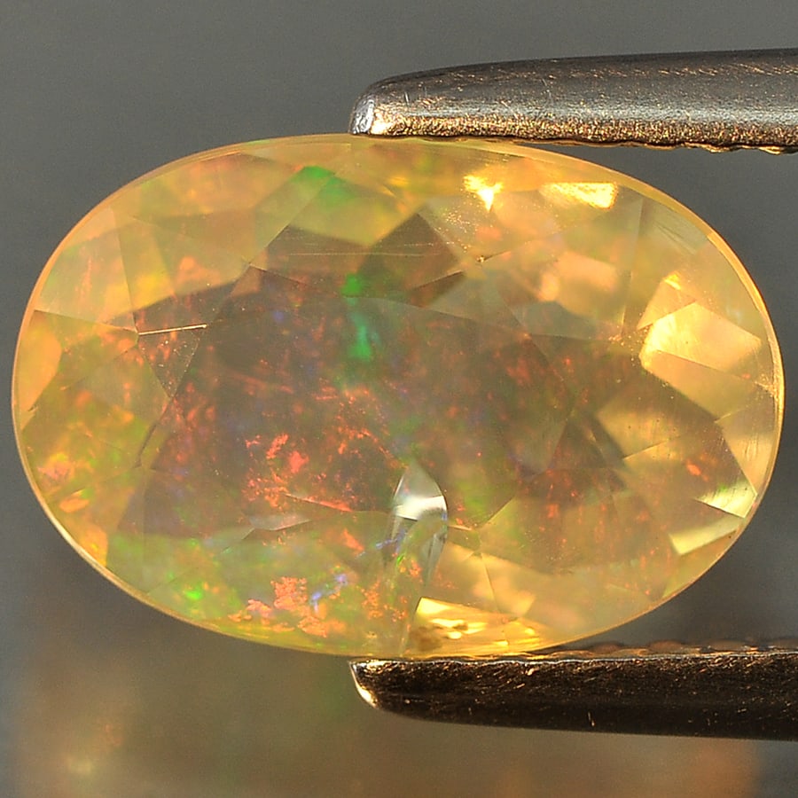 Natural Multi Color Opal Gemstones 1.82 Ct. Oval Shape 10.7 x 7.7 Mm. (1 of 3)