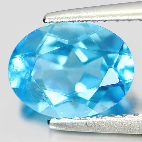 Natural Swiss Blue Topaz Gemstones 2.52 Ct. Oval Shape 9 x 7.1 Mm: Product ID: 807162307 Product Name: Natural Blue Topaz Weight: 2.52 CT. Size: 9 x 7.1 x 5.3 MM. Shape: Oval Color: Swiss Blue Clarity:VVS Luster: Good Gems Origin: Brazil Treatment: Treated Crystal St