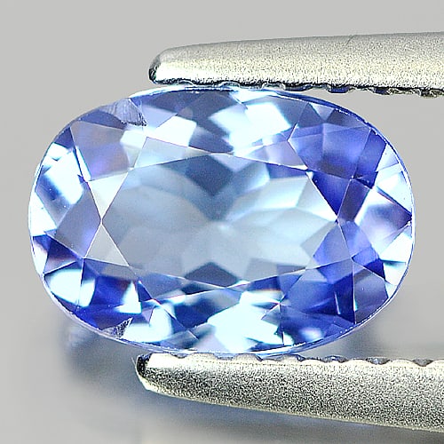 Natural Violetish Blue Tanzanite Gemstones 0.99 Ct. Oval Shape 7.45 x 5.27 Mm.: Product ID: 807004352 Product Name: Natural Tanzanite Weight: 0.99 CT. Size: 7.45 x 5.27 x 3.27 MM. Shape: Oval Color: Blue Clarity:VSI Luster: Good Gems Origin: Tanzania Treatment: Heated Crystal Str