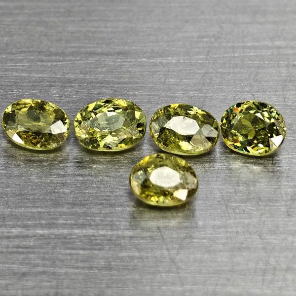 Natural Green Demantiod Garnet Gemstones 1 .20 Ct. 5 Pcs. Oval Shape 4.4 x 3.2 Mm.: Product ID: 802937594 Product Name: Natural Demantoid Weight: 1.20 CT. Size: 4.4 x 3.2 x 2.4 MM. Shape: Oval Shape Color: Green Clarity:SI1 Luster: Good Gems Origin: Madagascar Treatment: Unheated Cry