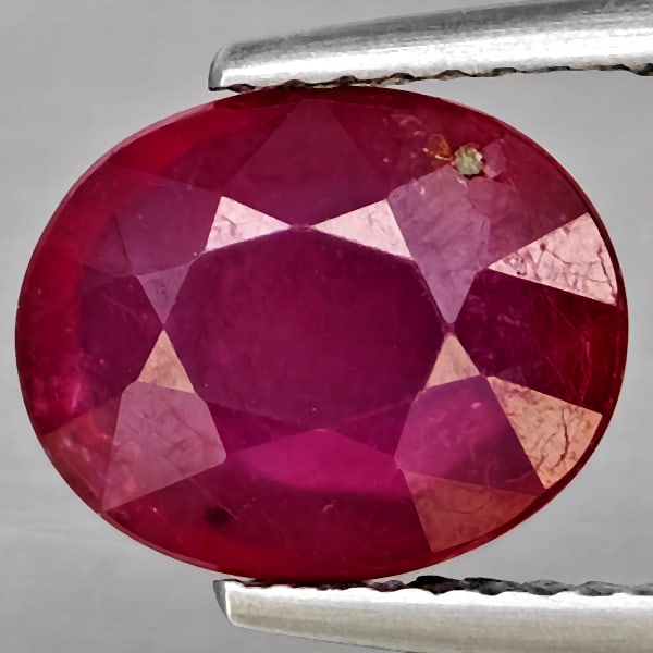 Natural Purplish Red Ruby Gemstones 3.45 Ct. Oval Shape 10 x 8.2 Mm.: Product ID: 805935943 Product Name: Natural Ruby Weight: 3.45 CT. Size: 10 x 8.2 x 4.6 MM. Shape: Oval Color: Purplish Red Clarity:SI1 Luster: Good Gems Origin: Madagascar Treatment: Heated (Lead-glas