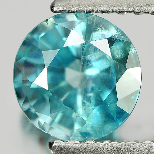 Natural Blue Color Zircon Gemstones 1.78 Ct. Round Shape 6.8 Mm.: Product ID: 807713795 Product Name: Natural Zircon Weight: 1.78 CT. Size: 6.8 x 6.8 x 4.3 MM. Shape: Round Color: Blue Clarity:SI Luster: Good Gems Origin: Cambodia Treatment: Heated Crystal Structure