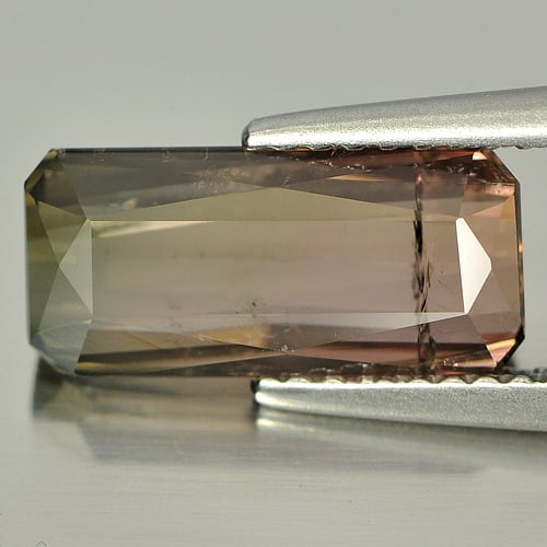 Natural Multi-Color Tourmaline Gemstones 3.23 Ct. Octagon Shape 12.4 x 5.8 Mm.: Product ID: 807229839 Product Name: Natural Tourmaline Weight: 3.23 CT. Size: 12.4 x 5.8 x 4.2 MM. Shape: Octagon Color: Multi-Color Clarity:SI1 Luster: Good Gems Origin: Nigeria Treatment: Unheated C