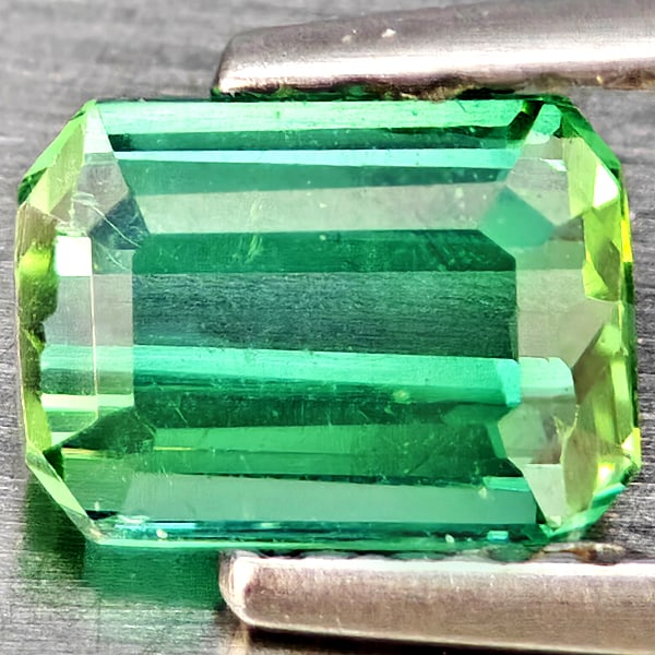 Natural Green Tourmaline Gemstones 0.94 Ct. Octagon Shape 5.7 x 4 Mm.: Product ID: 807251123 Product Name: Natural Tourmaline Weight: 0.94 CT. Size: 5.7 x 4 x 3.3 MM. Shape: Octagon Color: Green Clarity:SI1 Luster: Good Gems Origin: Nigeria Treatment: Unheated Crystal St