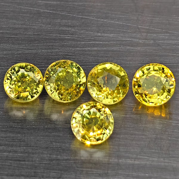 Natural Greenish Yellow Titanium Sphene Gemstones Rainbow Spark 1.48 Ct. 5 Pcs. Round Shape 4.2 Mm.: Product ID: 806509417 Product Name: Natural Sphene Weight: 1.48 CT. Size: 4.2 x 4.2 x 3.3 MM. Shape: Round Color: Greenish Yellow Titanium Rainbow Spark Clarity:SI1 Luster: Good Gems Origin: Madagasca