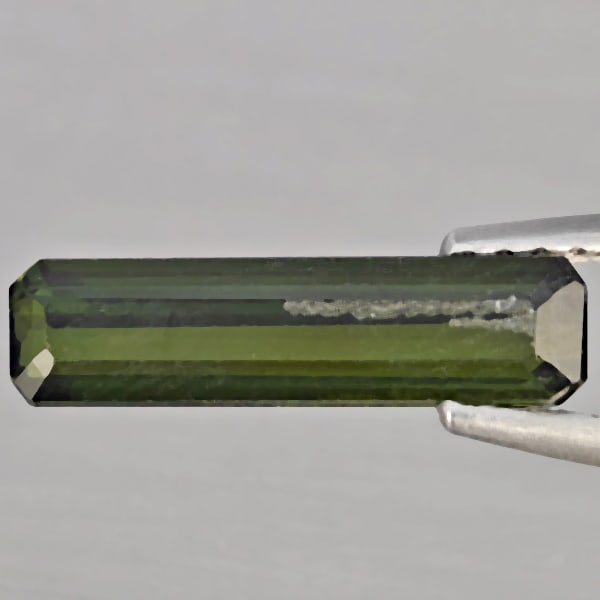 Natural Green Tourmaline Gemstones 1.44 Ct. Octagon Shape 14.2 x 3.6 Mm.: Product ID: 807251608 Product Name: Natural Tourmaline Weight: 1.44 CT. Size: 14.2 x 3.6 x 3 MM. Shape: Octagon Color: Green Clarity:SI Luster: Good Gems Origin: Nigeria Treatment: Unheated Crystal St