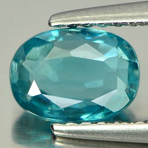 Natural Blue Zircon Cambodia Gemstones 1.39 Ct. Oval Shape 7.3 x 5.3 Mm.: Product ID: 807717325 Product Name: Natural Zircon Weight: 1.39 CT. Size: 7.3 x 5.3 x 2.7 MM. Shape: Oval Color: Blue Clarity:VSI Luster: Good Gems Origin: Cambodia Treatment: Heated Crystal Structure
