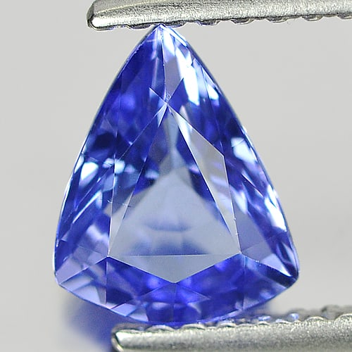 Natural Violetish Blue Tanzanite Gemstones 1.00 Ct. Trilliant Shape 7.47 x 6.00 Mm.: Product ID: 807005751 Product Name: Natural Tanzanite Weight: 1.00 CT. Size: 7.47 x 6.00 x 3.58 MM. Shape: Trilliant Color: Blue Clarity:VVS Luster: Good Gems Origin: Tanzania Treatment: Heated Crysta