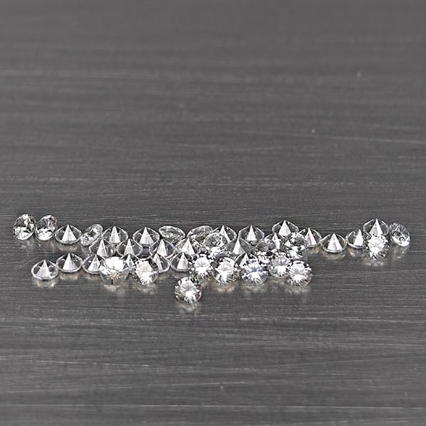 Natural White Zircon Gemstones 0.90 Ct. 42 Pcs. Round Diamond Cut 1.5 Mm.: Product ID: 807743159 Product Name: Natural Zircon Weight: 0.90 CT. Size: 1.5 x 1.5 x 1.2 MM. Shape: Round Diamond Cut Color: White Clarity:VSI Luster: Good Gems Origin: Cambodia Treatment: Heated Cry