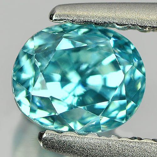 Natural Blue Zircon Gemstones 1.07 Ct. Oval Shape 5.2 x 4.4 Mm.: Product ID: 807709656 Product Name: Natural Zircon Weight: 1.07 CT. Size: 5.2 x 4.4 x 4.5 MM. Shape: Oval Color: Blue Clarity:VSI Luster: Good Gems Origin: Cambodia Treatment: Heated Crystal Structure