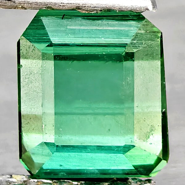 Natural Green Tourmaline Gemstones 0.84 Ct. Octagon Shape 5.2 x 4.5 Mm.: Product ID: 807251001 Product Name: Natural Tourmaline Weight: 0.84 CT. Size: 5.2 x 4.5 x 4 MM. Shape: Octagon Color: Green Clarity:SI1 Luster: Good Gems Origin: Nigeria Treatment: Unheated Crystal St