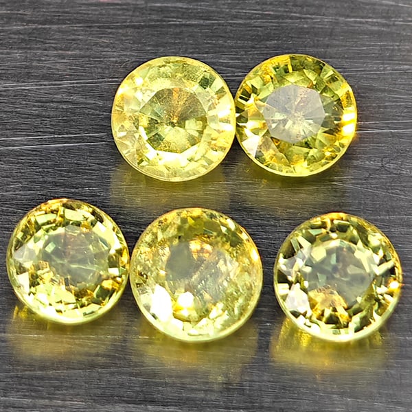 Natural Greenish Yellow Titanium Sphene Gemstones Rainbow Spark 1.54 Ct. 5 Pcs. Round Shape 3.9 Mm.: Product ID: 806509428 Product Name: Natural Sphene Weight: 1.54 CT. Size: 3.9 x 3.9 x 3 MM. Shape: Round Color: Greenish Yellow Titanium Rainbow Spark Clarity:SI1 Luster: Good Gems Origin: Madagascar 