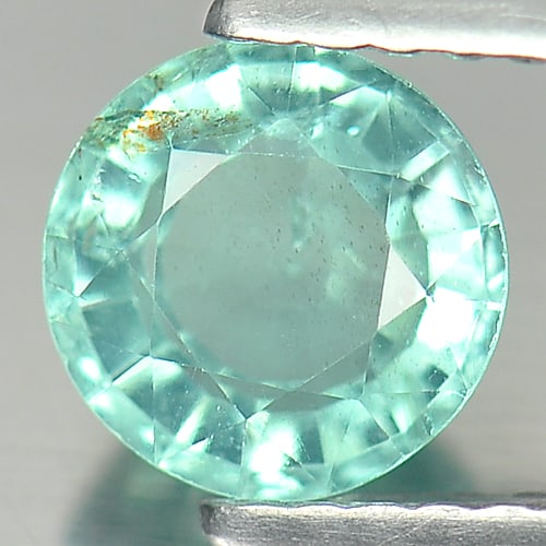 Natural Paraiba Color Apatite Gemstones 0.89 Ct. Round Shape 6 Mm.: Product ID: 800609149 Product Name: Natural Apatite Weight: 0.89 CT. Size: 6 x 6 x 3.5 MM. Shape: Round Color: Neon Green Clarity:SI Luster: Good Gems Origin: Tanzania Treatment: Unheated Crystal Stru