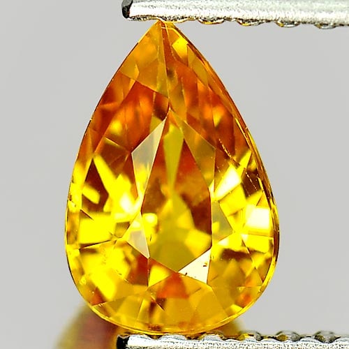 Natural Yellow Ceylon Sapphire Gemstones 0.94 Ct. Pear Shape 7.1 x 4.8 Mm.: Product ID: 806157620 Product Name: Natural Yellow Sapphire Weight: 0.94 CT. Size: 7.1 x 4.8 x 3.7 MM. Shape: Pear Color: Yellow Clarity:VSI Luster: Very Good Gems Origin: Sri - Lanka Treatment: Heate