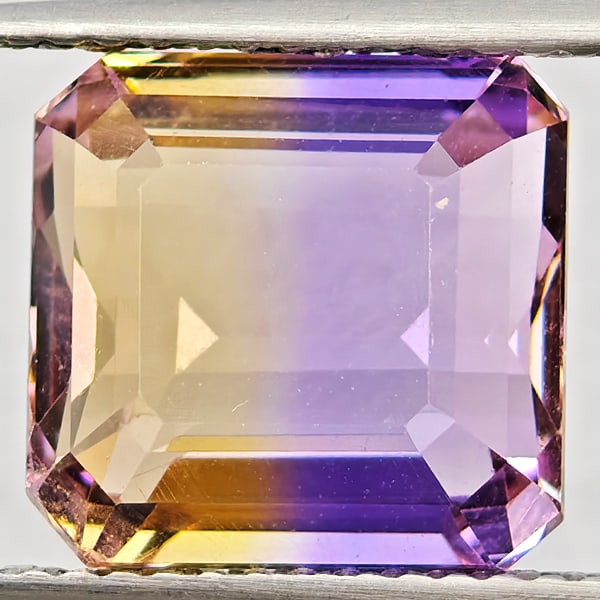 Natural Bi Color Ametrine Gemstones 5.27 Ct. Octagon Shape 10.2 x 9.8 Mm.: Product ID: 800408633 Product Name: Natural Ametrine Weight: 5.27 CT. Size: 10.2 x 9.8 x 6.5 MM. Shape: Octagon Color: Bi Color Clarity:VSI Luster: Good Gems Origin: Bolivia Treatment: Unheated Crysta