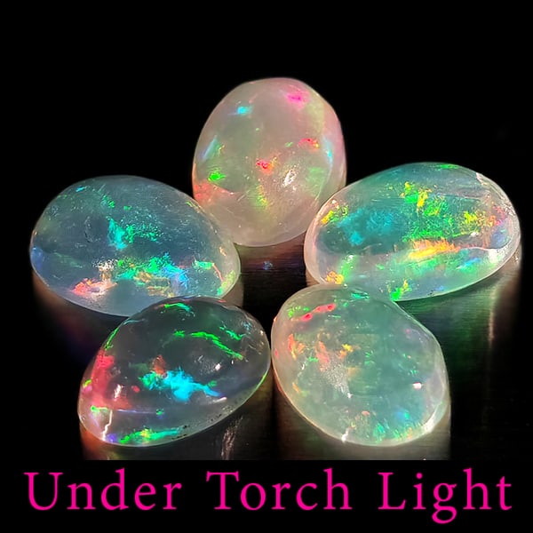 Natural Multi Color Opal Gemstones 1.46 Ct. 5 Pcs. Oval Cabochon Shape 6.1 x 4.2 Mm.: Product ID: 818728104 Product Name: Natural Opal Weight: 1.46 CT. Size: 6.1 x 4.2 x 2.4 MM. Shape: Oval Cabochon Color: Multi-Color Clarity:Semi - Transparent Luster: Good Gems Origin: Ethiopia Treatm