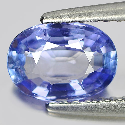Natural Violetish Blue Tanzanite Gemstones 1.03 Ct. Oval Shape 7.59 x 5.50 Mm.: Product ID: 107000708 Product Name: Natural Tanzanite Weight: 1.03 CT. Size: 7.59 x 5.50 x 3.07 MM. Shape: Oval Color: Blue Clarity:VVS Luster: Good Gems Origin: Tanzania Treatment: Heated Crystal Str