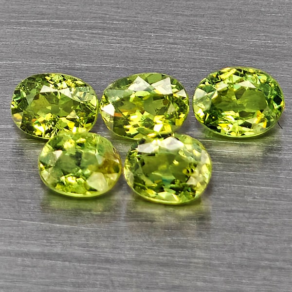 Natural Green Demantiod Garnet Gemstones 1.22 Ct. 5 Pcs. Oval Shape 4.2 x 3.2 Mm.: Product ID: 802937577 Product Name: Natural Demantoid Weight: 1.22 CT. Size: 4.2 x 3.2 x 2.4 MM. Shape: Oval Color: Green Clarity:SI1 Luster: Good Gems Origin: Madagascar Treatment: Unheated Crystal S