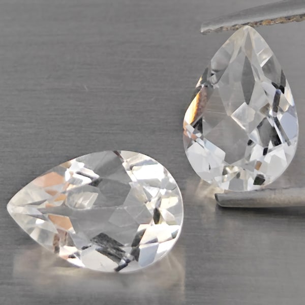 Natural White Quartz Gemstones 2.94 Ct. 2 Pcs Pear Shape 10.1 x 7.1 Mm.: Product ID: 805530259 Product Name: Natural Quartz Weight: 2.94 CT. Size: 10.1 x 7.1 x 4.4 MM. Shape: Pear Shape Color: White Clarity:VSI Luster: Good Gems Origin: Brazil Treatment: Unheated Crystal S