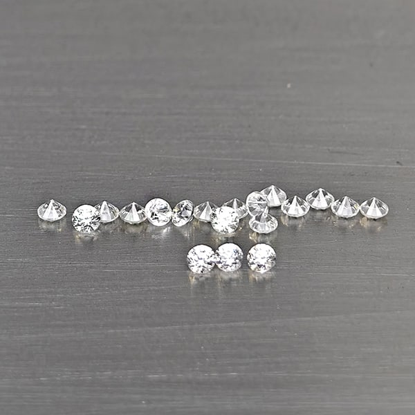 Natural White Zircon Gemstones 0.36 Ct. 19 Pcs. Round Diamond Cut 1.8 Mm.: Product ID: 807743139 Product Name: Natural Zircon Weight: 0.36 CT. Size: 1.8 x 1.8 x 1.3 MM. Shape: Round Diamond Cut Color: White Clarity:VSI Luster: Good Gems Origin: Cambodia Treatment: Heated Cry